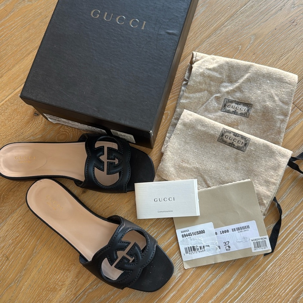 Authentic $750 GUCCI interlocking GG logo cutout slides mules 37 black leather